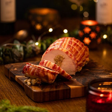 Maloneys Turkey boneless, stuffed & wrapped in streaky bacon 1kg